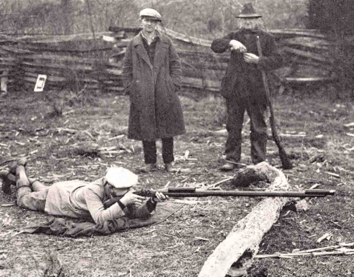 A muzzleloading rifleman trying his best to place “three balls in a row in a sap hole.” From The Muzzleloading Rifle, Then and Now by Walter M. Cline.